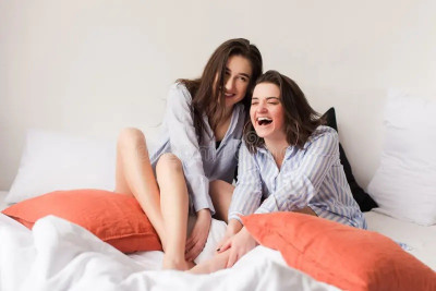 Girls Laugh on bed 2.jpg