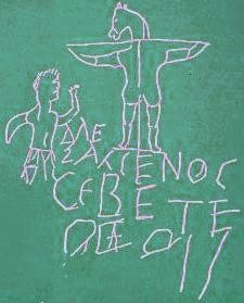 un des premiers graphitis christianophobe, Jesus est représenté avec une tete d'ane